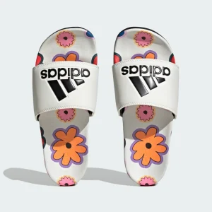 Sandalias Adidas con diseño floral colorido y logo en la parte superior.